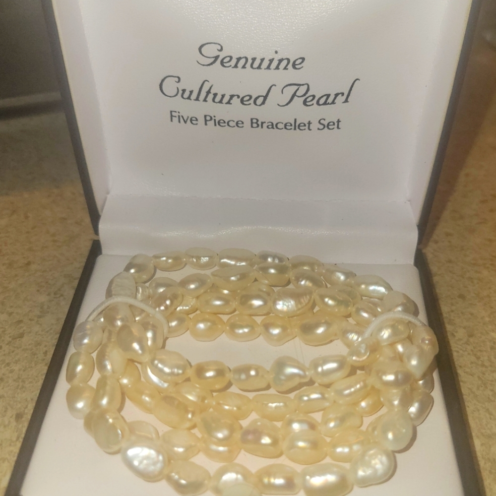 Pearl necklaces real? Costume?